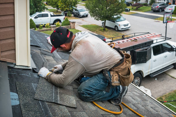 Professional Roofing technician working in North Street, MI